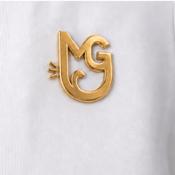 Raised gold MG emblem detail